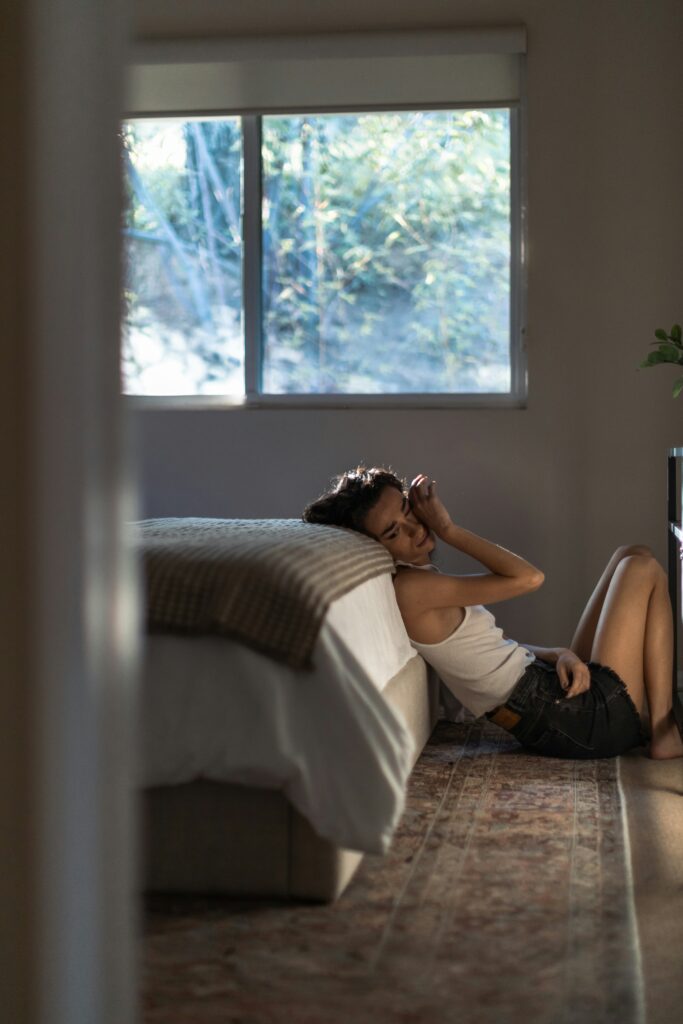 woman lays on the floor