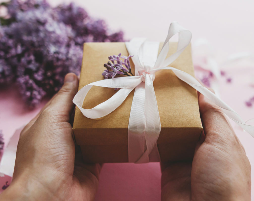 Woman holding gift in her hands