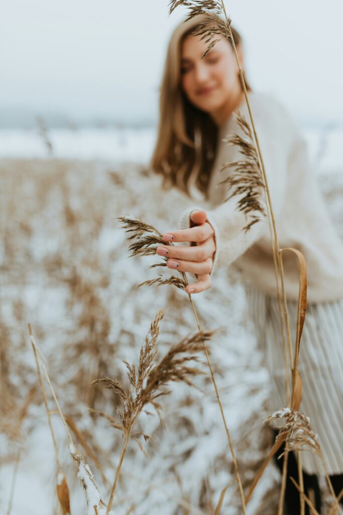 woman touching grass